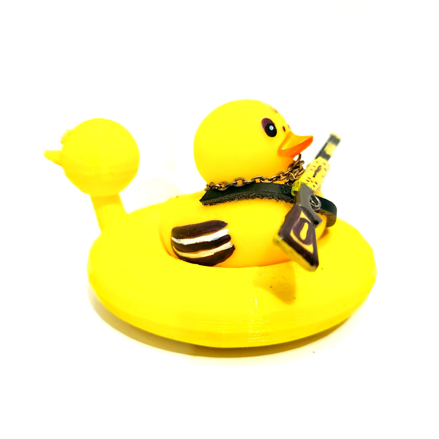 Yellow Horror Duck with Rifle side view